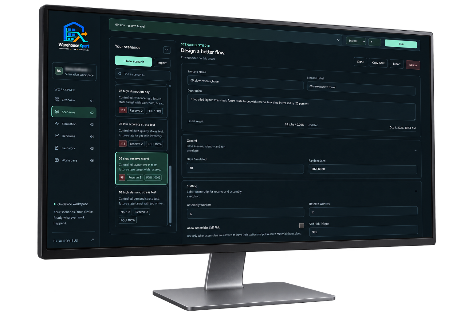 WarehouseXpert scenario studio on a desktop monitor
